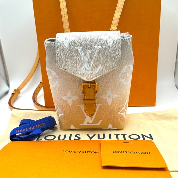 Louis Vuitton Handbags - ‼️SOLD‼️Louis Vuitton Mist Gray Giant Monogram Coated Canvasby The Pool Backpack